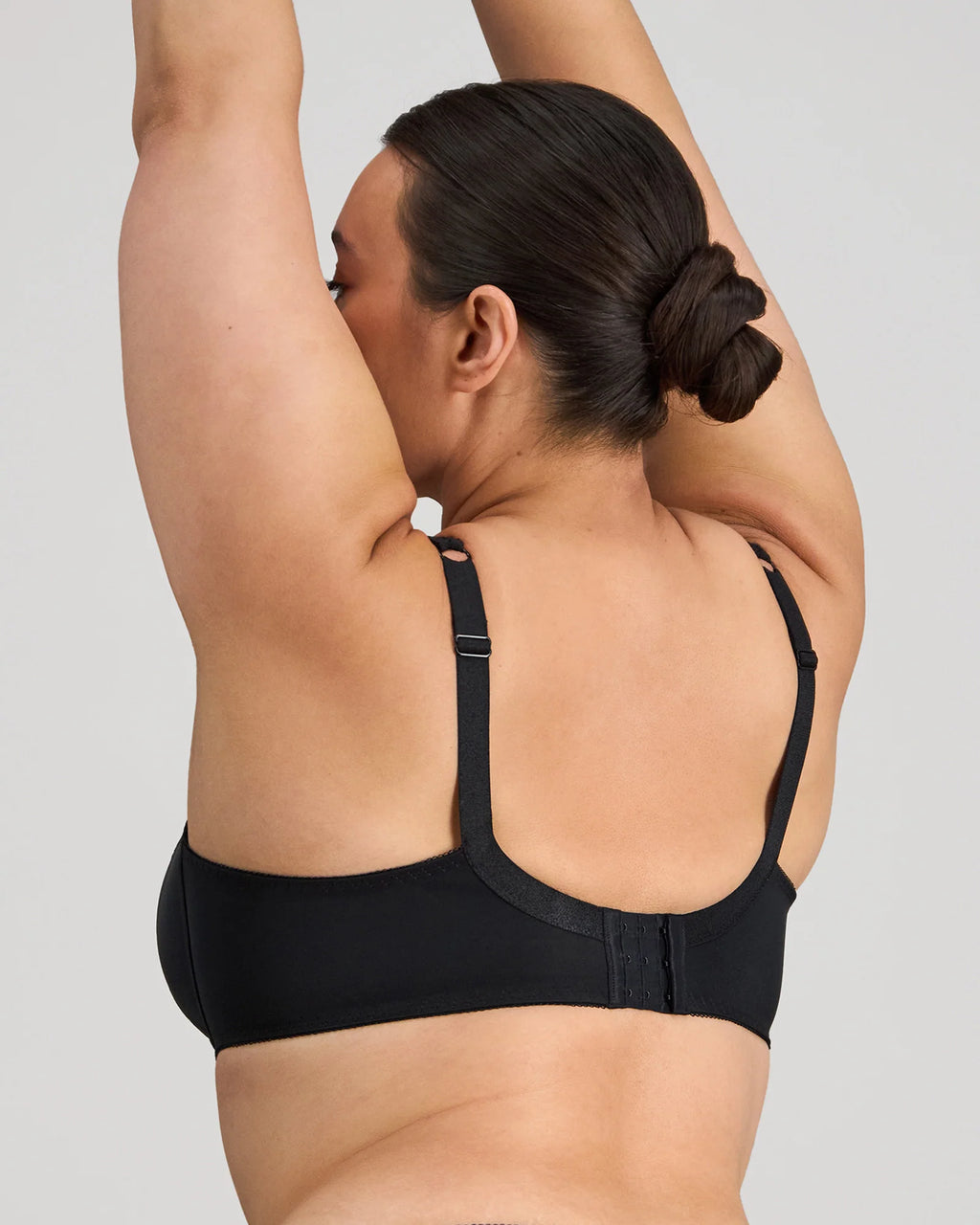 Black Coral Underwire Bra by Fayreform, showing the supportive underwire design and smooth fabric with adjustable straps.