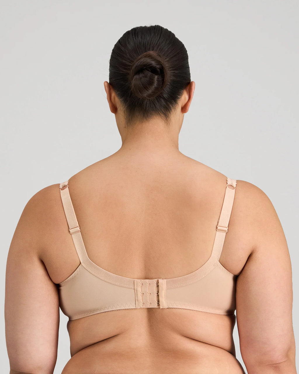 Fayreform Coral Underwire Bra in Latte with floral lace embroidery, showcasing the detailed lace design and supportive underwire.