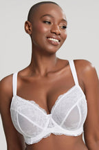 White semi-sheer lace plunge bra by Panache, size 12F, featuring adjustable straps and delicate detailing.