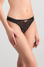 Black lace Grand Finale thong by Pleasure State in size M, featuring delicate trim and a comfortable fit.