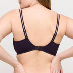 Primadonna Twist East End full cup bra in charcoal with supportive design and smooth fabric, displayed on a model.