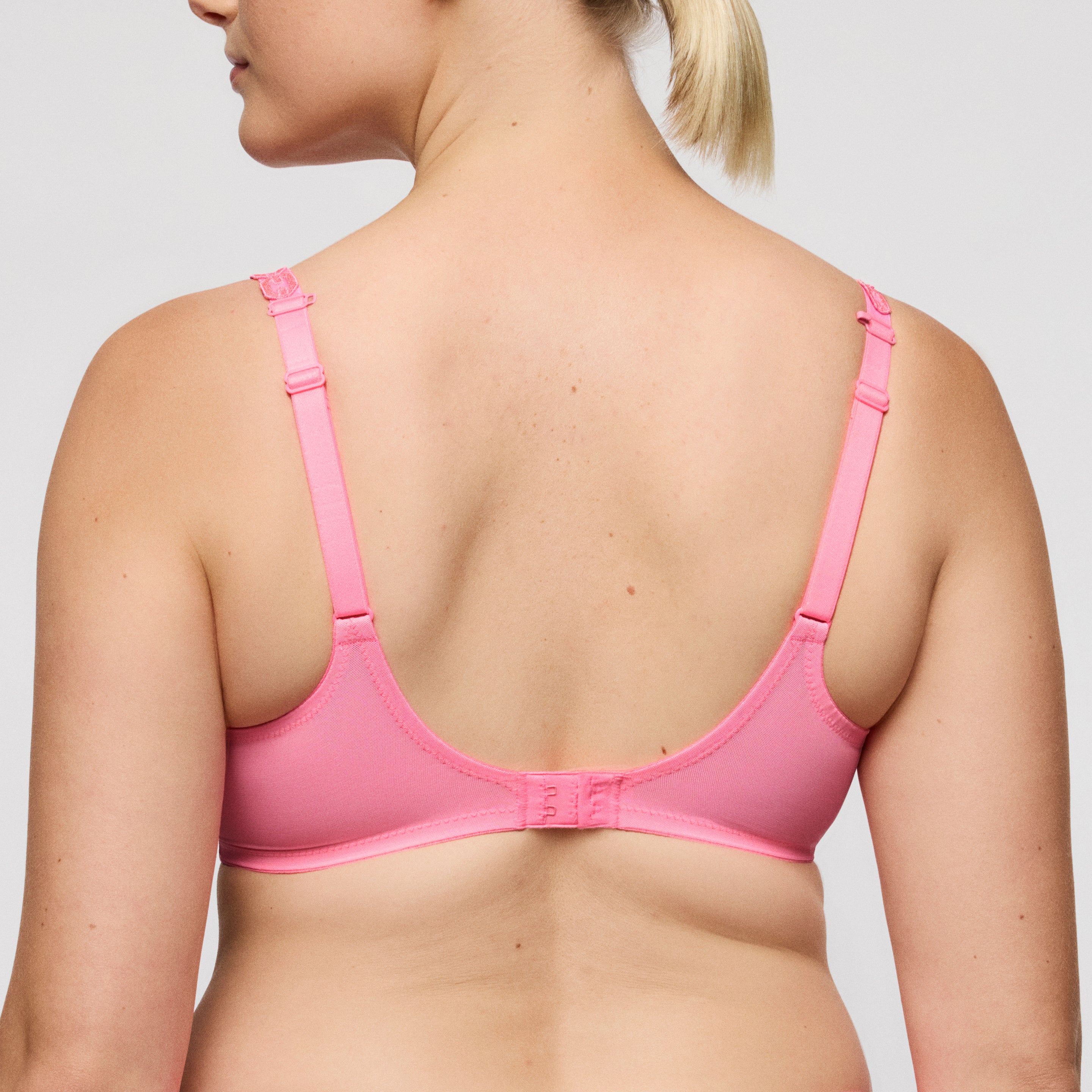 Primadonna Twist Twixie full cup bra in happy pink, showcasing supportive design with smooth cups and delicate straps.