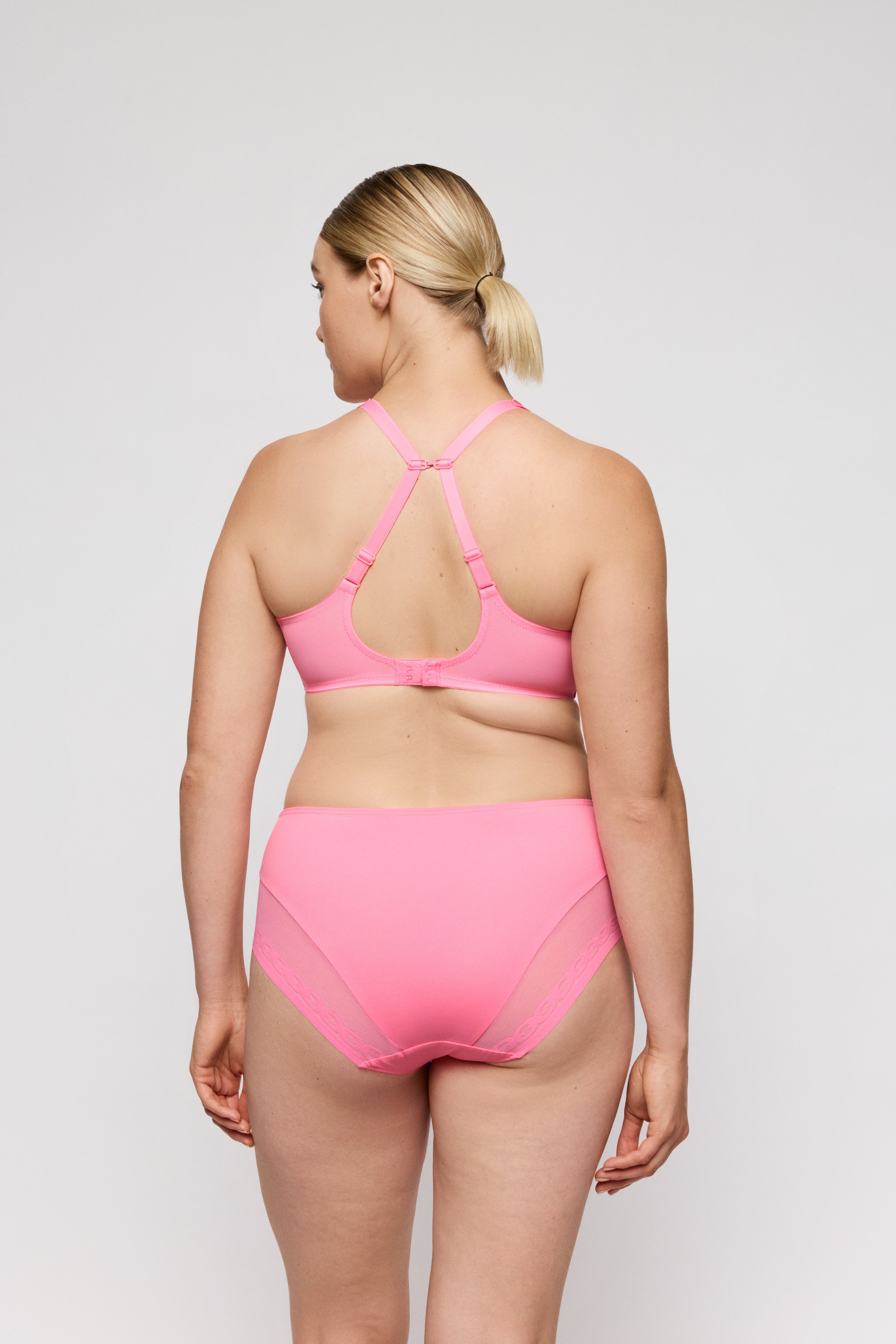 Primadonna Twist Twixie full cup bra in happy pink with smooth cups and delicate detailing, designed for comfortable support.