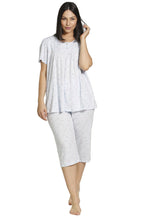 Blue floral capri pajama set in poly cotton blend by Schrank, featuring short sleeves and comfortable capri pants