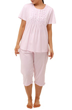 Pink cotton pajama set featuring wildflower print, available in sizes 14-24 from SCHRANK