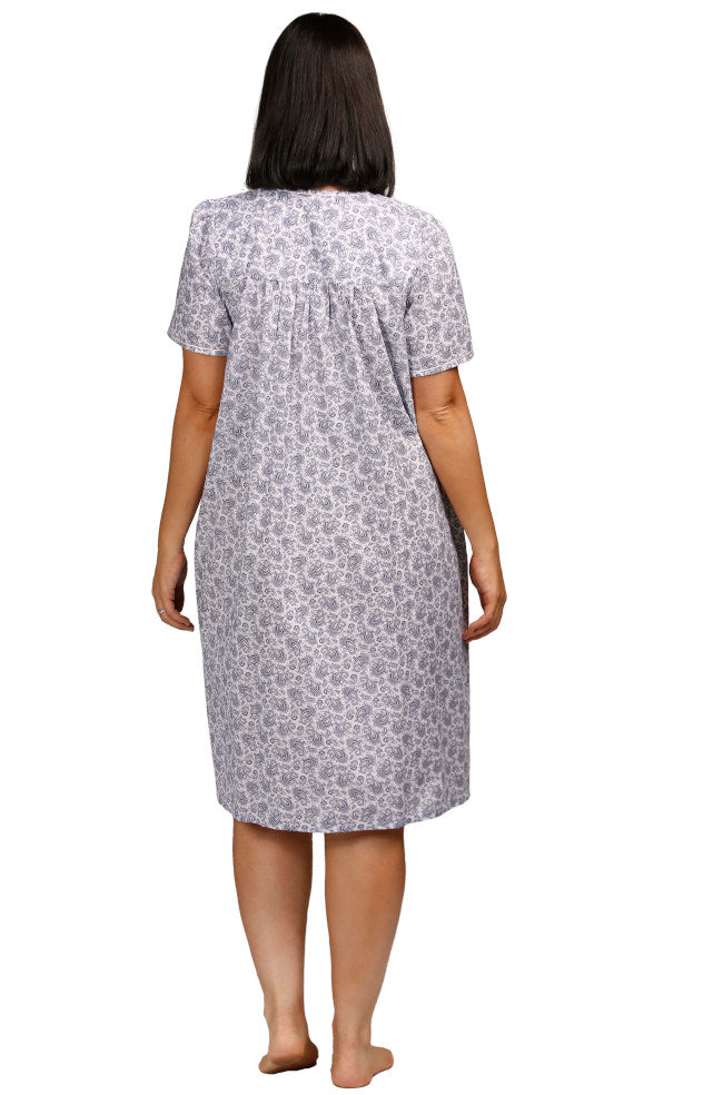 Lightweight pink cotton nightie with short sleeves and button front, featuring a paisley print, by Schrank.