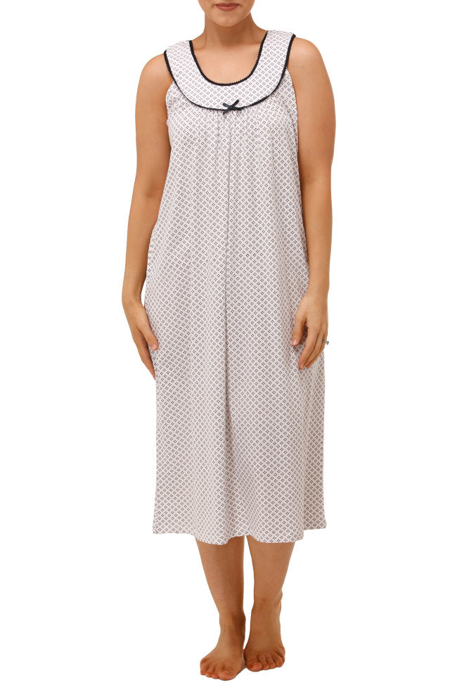 White sleeveless cotton nightie in size 14 by SCHRANK, showcasing a relaxed fit and simple design.
