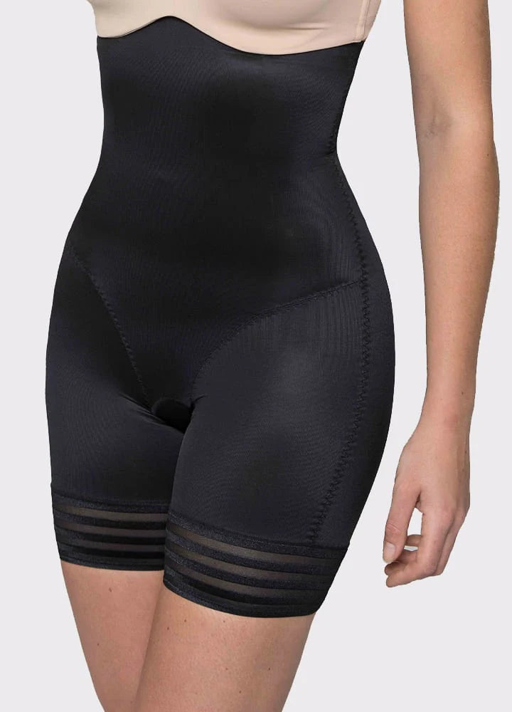LA SCULPTE firm control high waisted shapewear shorts shown on a model, highlighting shaping and smoothing features.