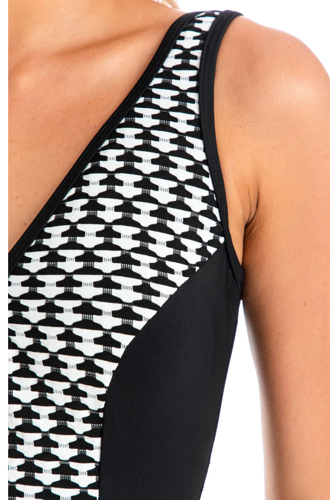 Black and white V-neck zip one-piece swimsuit by TOGS with tummy control, designed for stylish swimwear comfort.