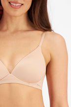 Nude Berlei Understate wirefree bra with ultrathin, smooth support and seamless design, showing front view on a white background.