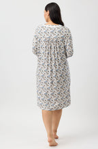 YUU Primrose long sleeve nightie in sand, soft sleepwear with a relaxed fit, displayed on a hanger.