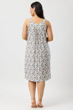 Sand-colored sleeveless nightie from YUU, featuring a relaxed fit, made for comfortable sleepwear.