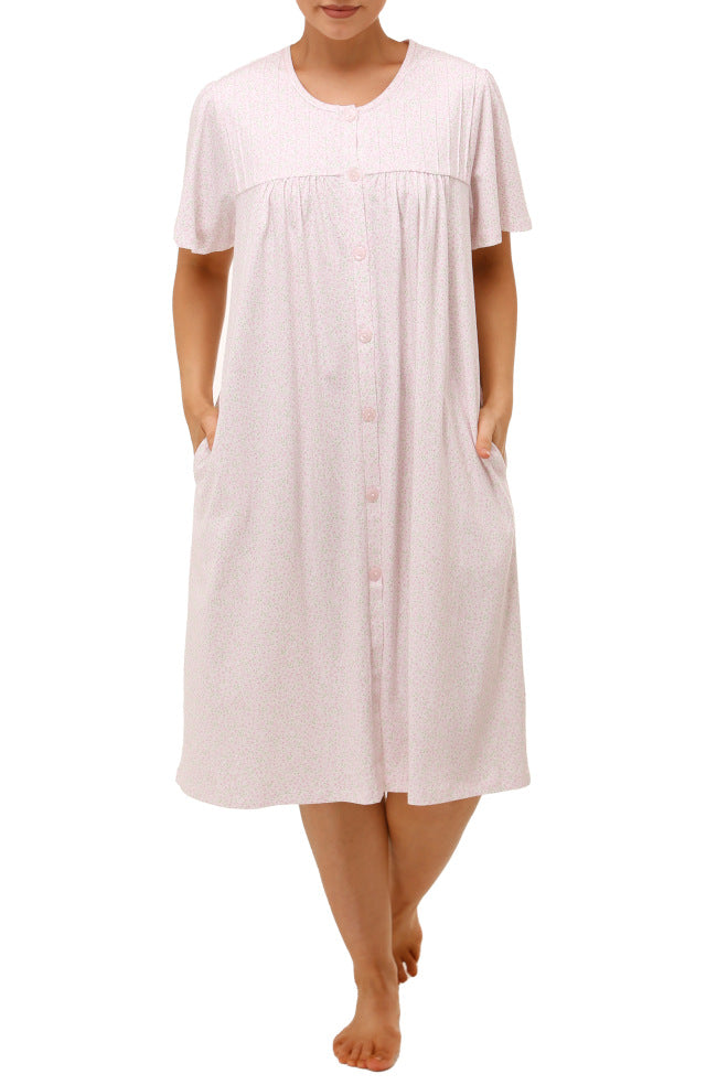 Pink floral print brunch coat by Schrank, size 10, featuring a button front and made of easy-care poly cotton.