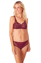 Red and nude wirefree mastectomy bra with adjustable straps by Amoena, size 10A/10DD