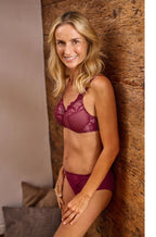Red and nude wirefree mastectomy bra by Amoena, featuring adjustable straps, size 10A 10DD.