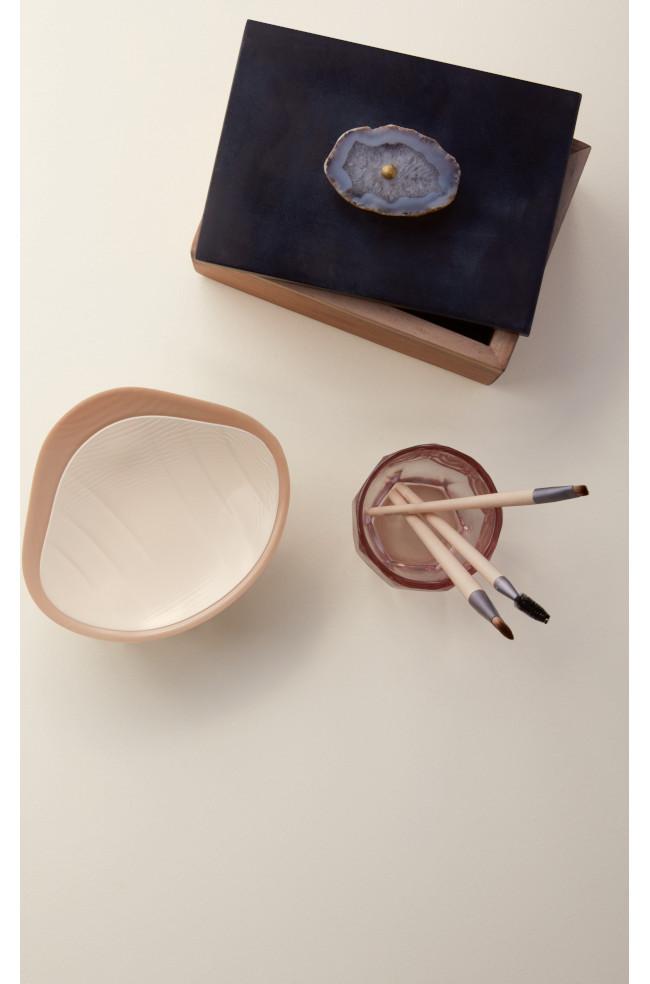 Nude silicone breast prosthesis from Amoena's Natura Xtra Light mastectomy range, available in size 6, 7, and 8.