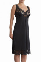Black full slip with built-up shoulders, available in sizes 12, 14, and 16 by Brandella.