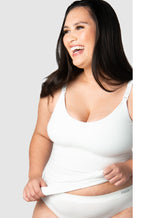 White maternity camisole by HOT MILK, featuring adjustable straps and soft fabric, available in sizes S and XL.