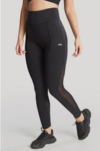 Black Panache Ultra Adapt Sports Leggings, size 12, featuring stretchy fabric and a sleek, form-fitting design.