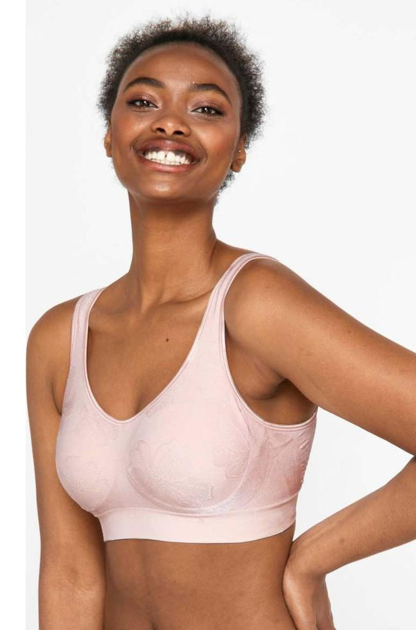 Playtex Flex Fit Contour Wirefree Bra in nude, featuring seamless design and comfortable support, available in multiple size