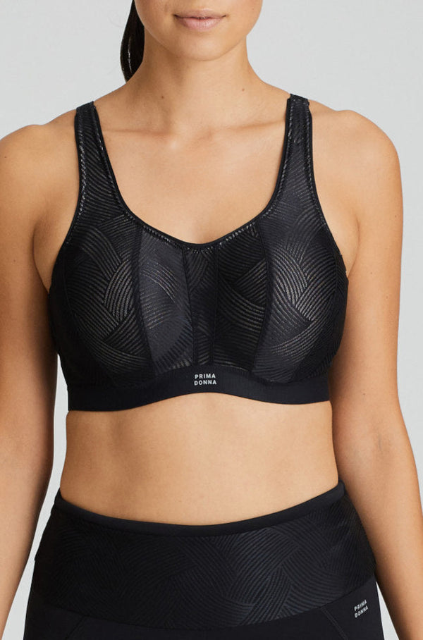Primadonna The Game underwire sports bra in black with padded cups, featuring supportive design and adjustable straps.