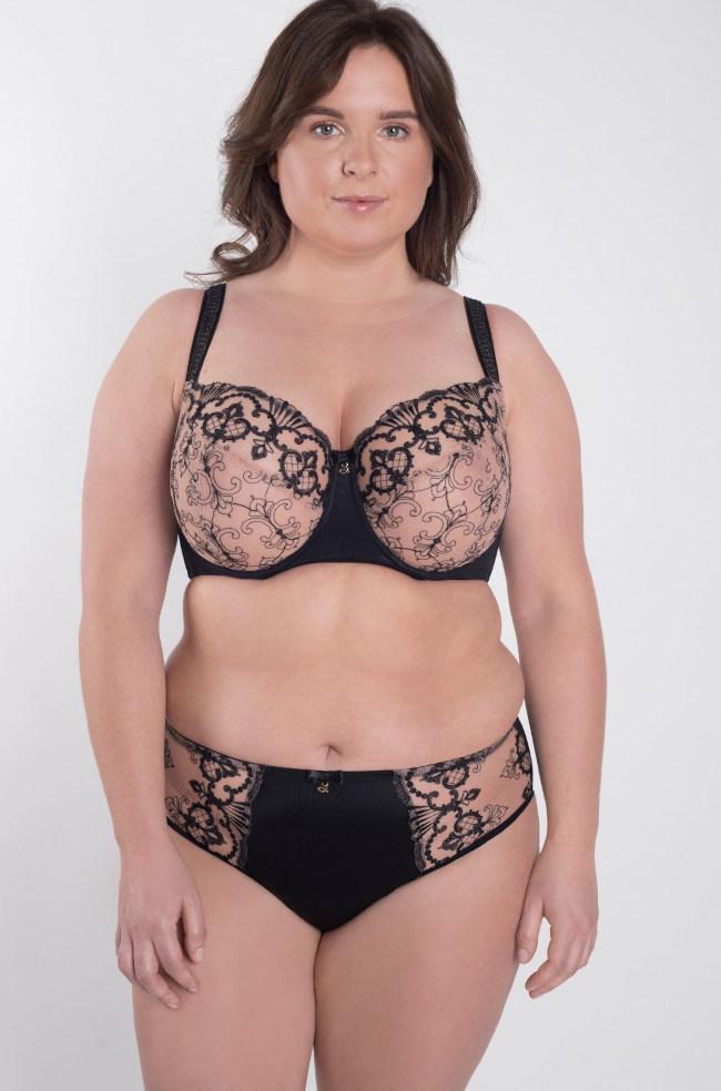 Black semi-sheer full brief with gold fittings by Samanta, showcasing elegant design and comfortable fit.
