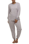 Pale pink floral cotton ski PJ set by SCHRANK, size 20, featuring a cozy long-sleeve top and matching pants.