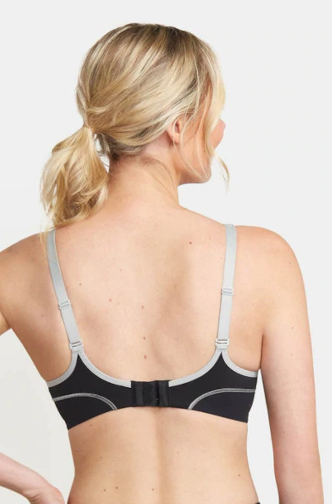 Black Triaction UW Performance Sports Bra by Triumph, designed for larger cup sizes, featuring a supportive fit.